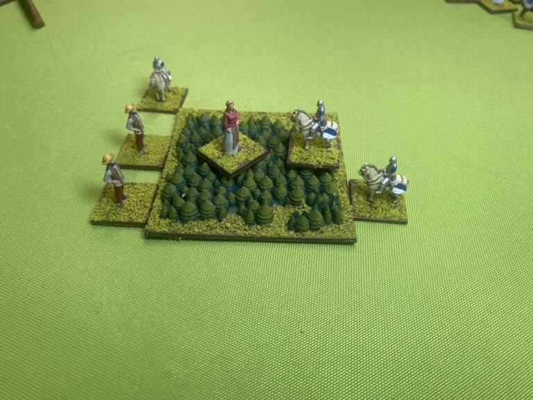 A horse rider chases down a villager unit in the forest